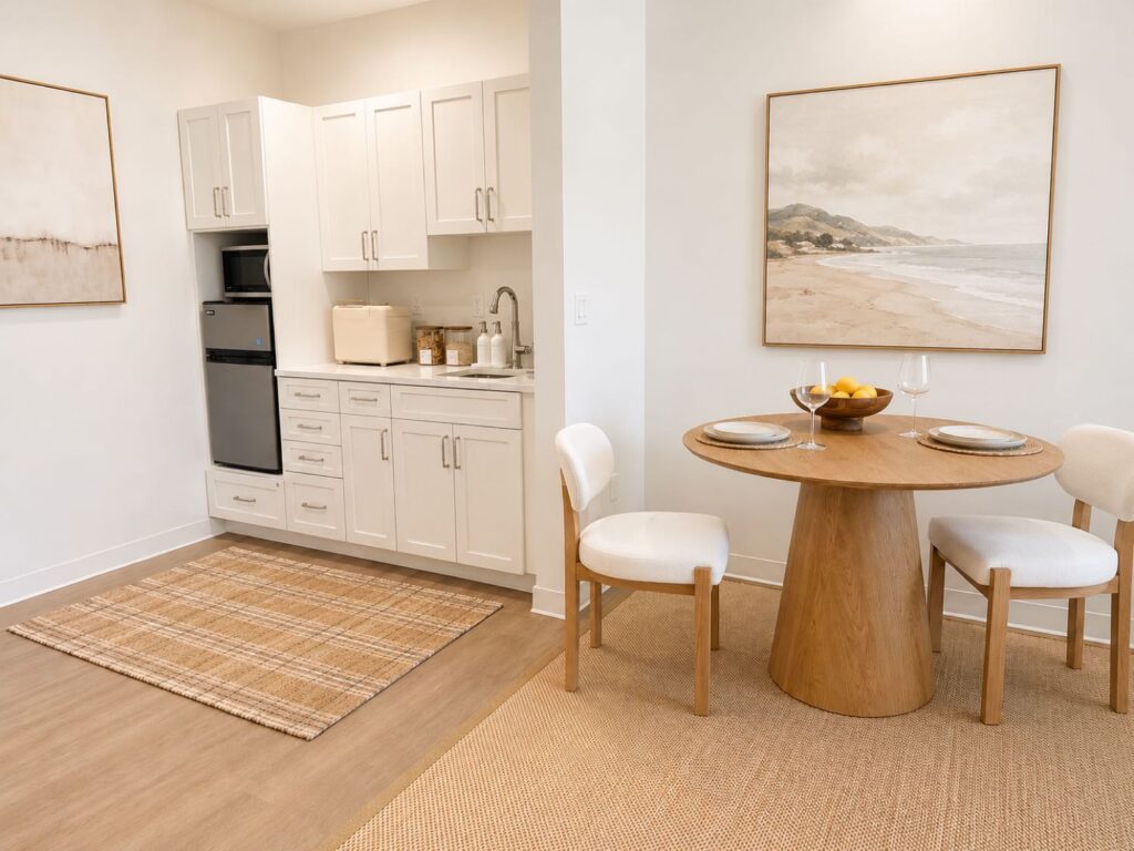 Model apartment kitchenette and dining area at Wingate Residences at Pleasant Bay