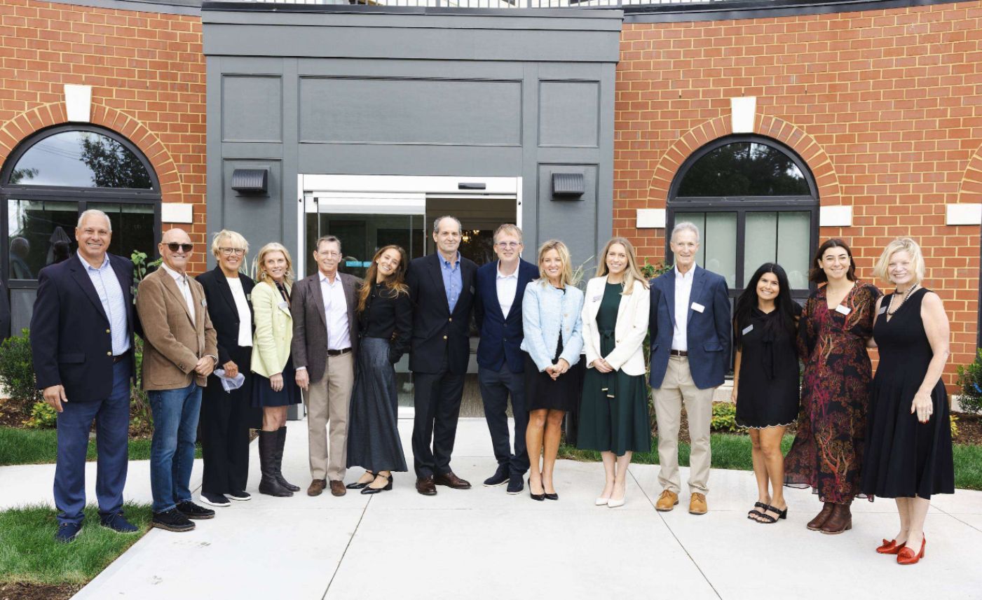 Representatives from Wingate Living and GingerCare Living celebrate the opening of One Wingate East in Needham